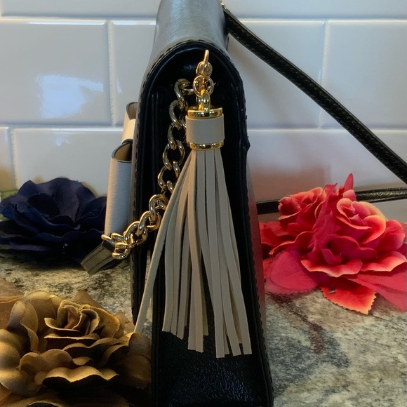 BUY IT NOW. NWOT, Kate Spade Robinson Street Crossbody Handbag Black/cream bow. - Picture 9 of 10